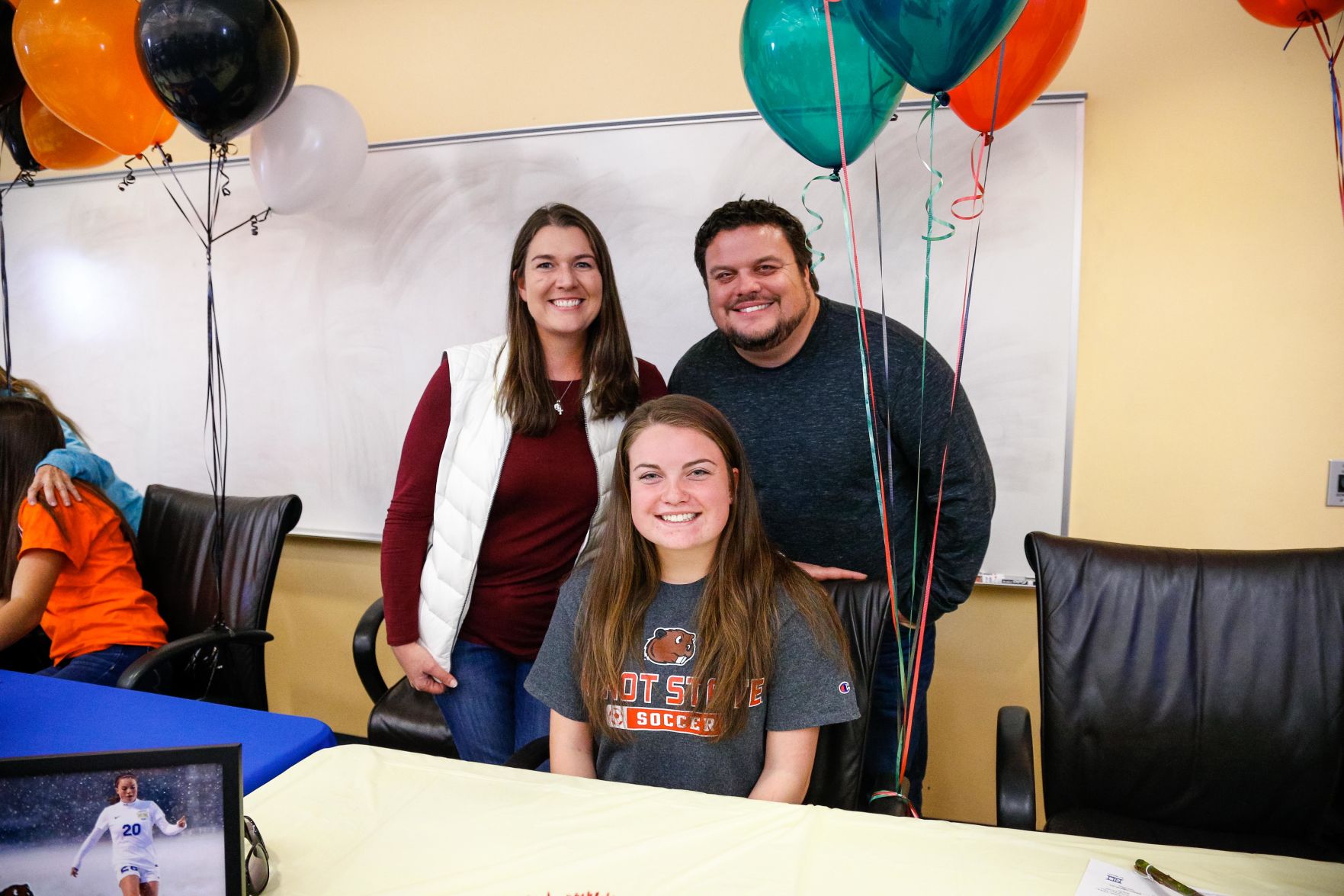 SIGNING DAY: Rampart athletes sign their National Letter of Intent